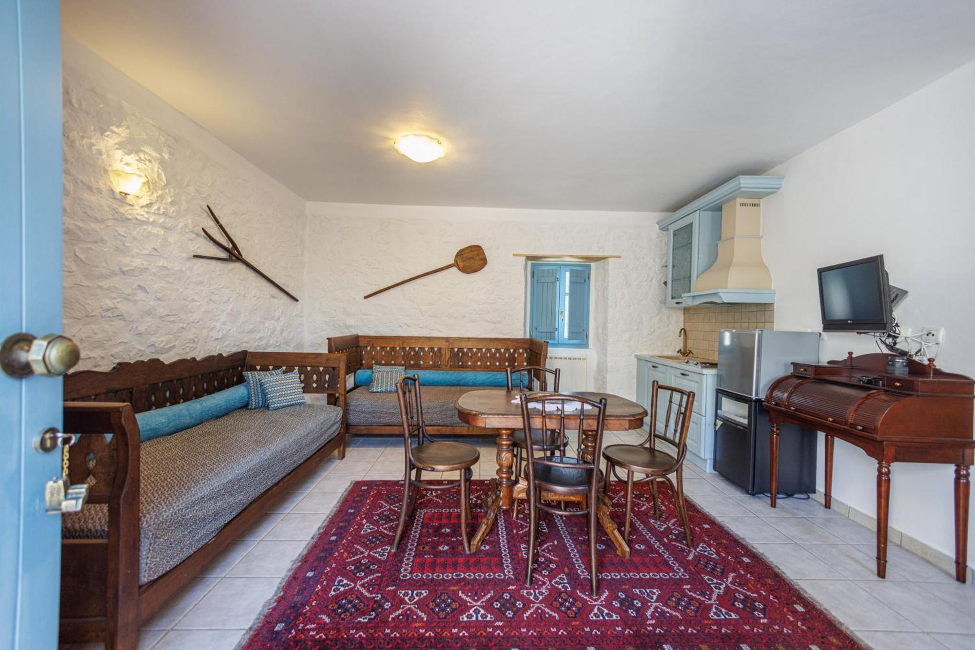 Lithos Stone Suites Ареополі Номер фото