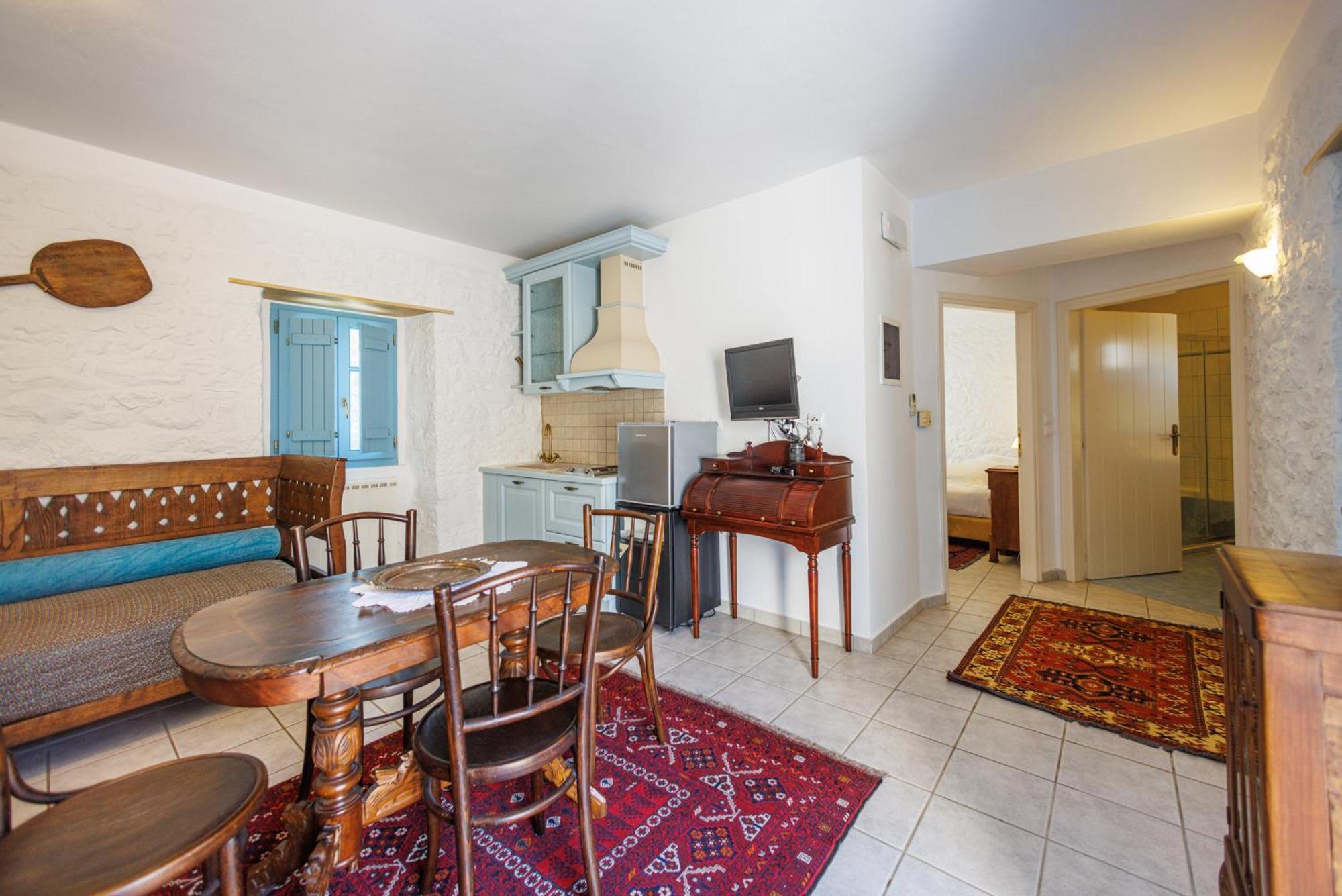 Lithos Stone Suites Ареополі Номер фото